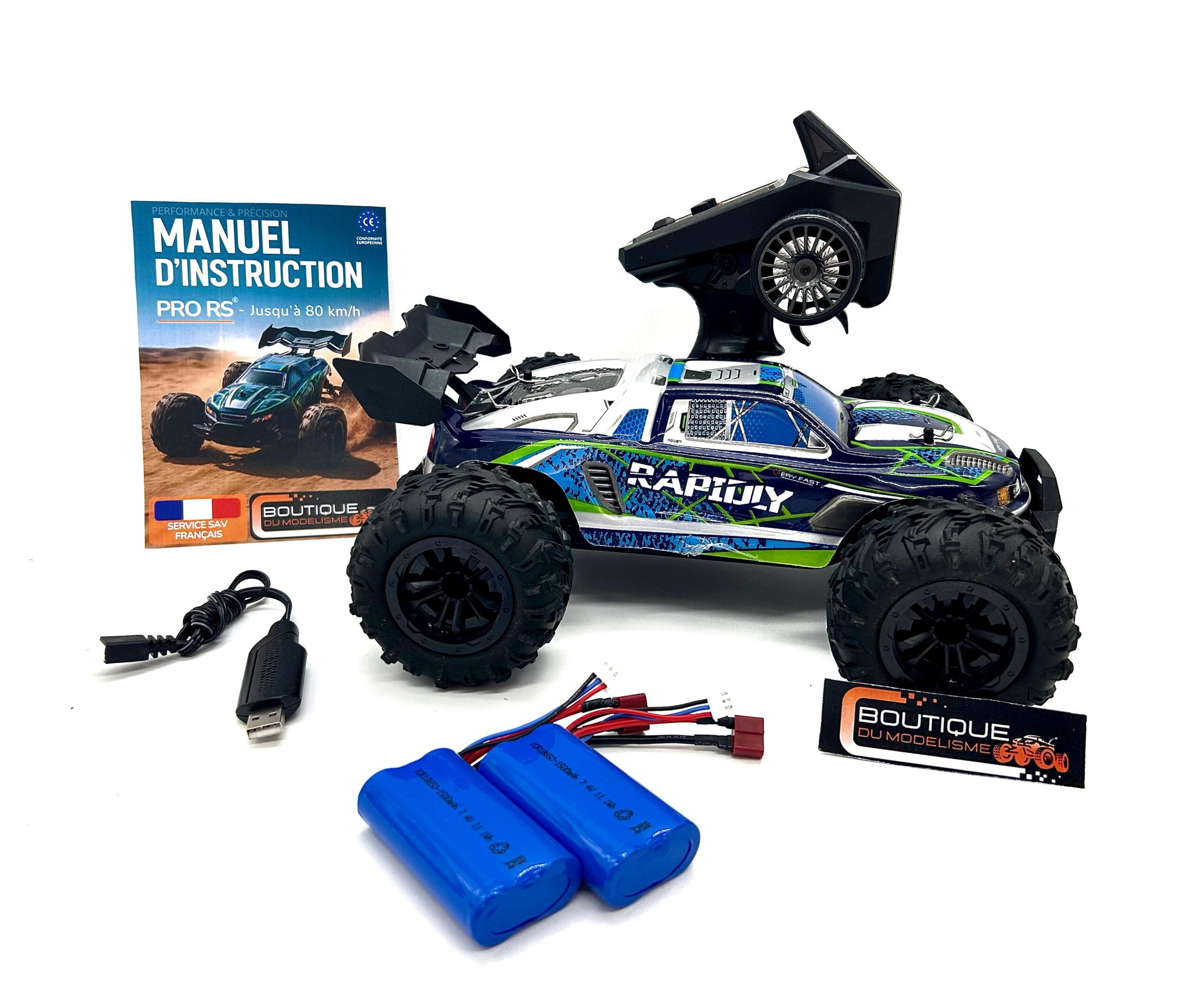 Contenu de la boîte Pro RS : voiture, télécommande, batterie et accessoires.